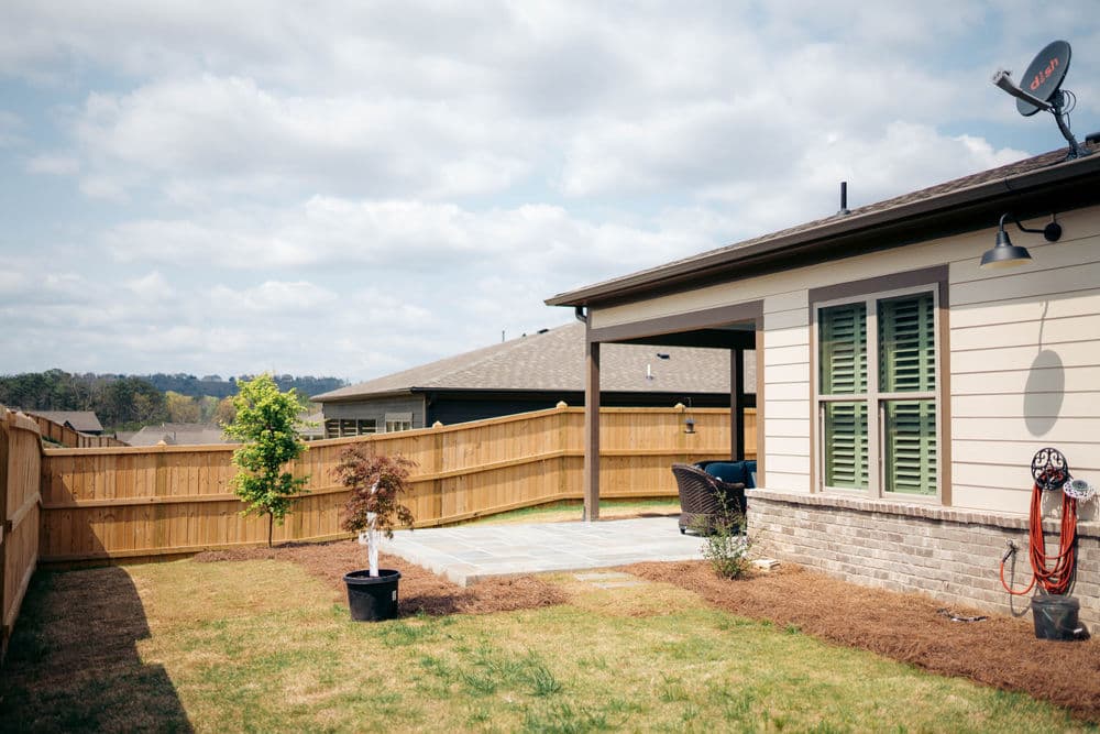 Project Backyard Patio Build with Tile and Covered Overhang in Westover image