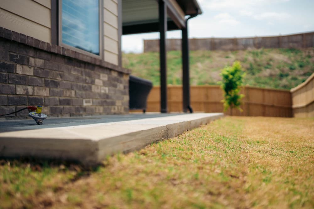 Gallery photos for Backyard Patio Build with Tile and Covered Overhang in Westover: Image #4